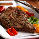 Grilled T-Bone Steak for Two with Lemon-Pesto Sauce